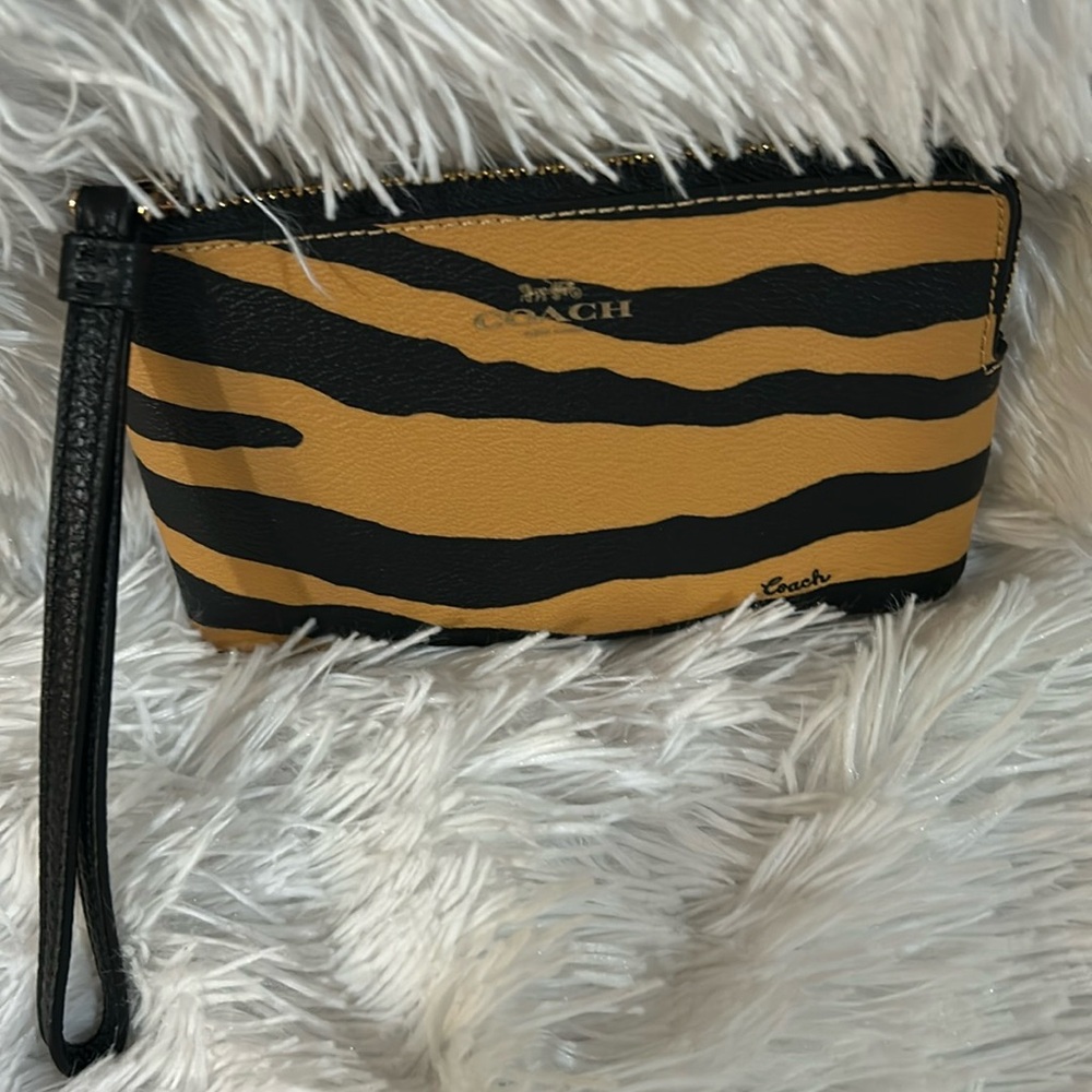 Coach Corner Zip Tiger Print Wristlet . New with tags.